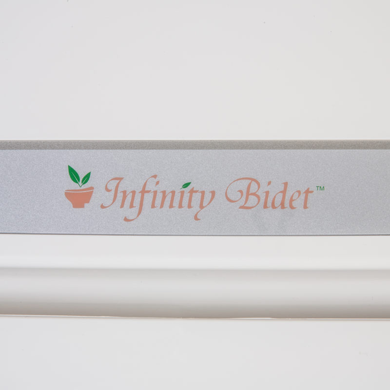 Clear Water Bidets, Infinity Bidet label on bidet seat